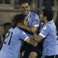 Uruguay celebrate their smashing win against Jordan