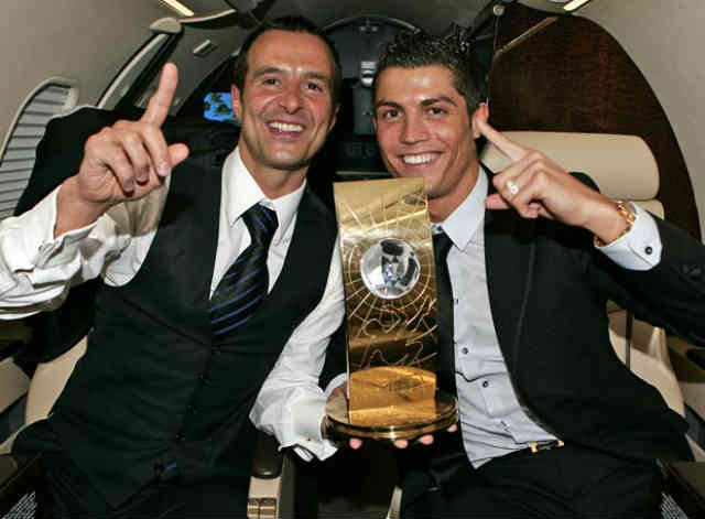 Jorge Mendes celebrates with Ronaldo his award