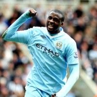 Manchester City and Ivory Coast star Yaya Toure celebrates