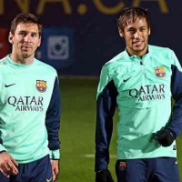 Messi with his team mate Neymar, back in training after his injury