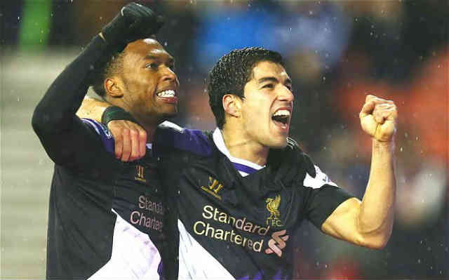 Suarez and Sturridge both celebrate their goals against Stoke City