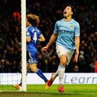 Samir Nasri celebrates his amazing goal against Chelsea